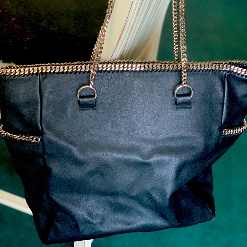 Z Gallerie Tote. 13”length X 18” wide. Black leather look with silver metal